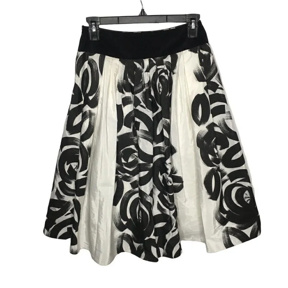 Young women black and white silky polyester skirt